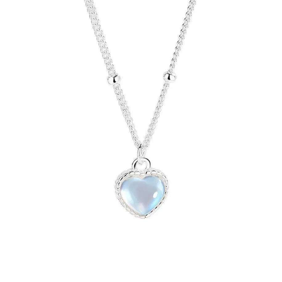 Japan-Korea Style Loving-Heart pendant necklace in silver-tone copper, featuring a glossy pale blue heart with a decorative border