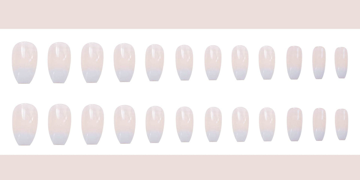 Wearable false nails in glossy ballet white gradient, assorted sizes with rounded tips for easy application