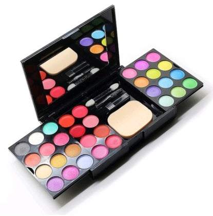 Makeup Set For Women in a black case with colorful matte eyeshadows, blush, powder, and applicators