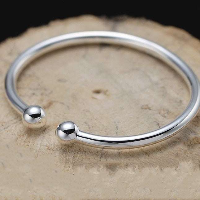 Garlic-head Plain Surface silver-tone copper open bangle with polished round ends and a sleek smooth finish