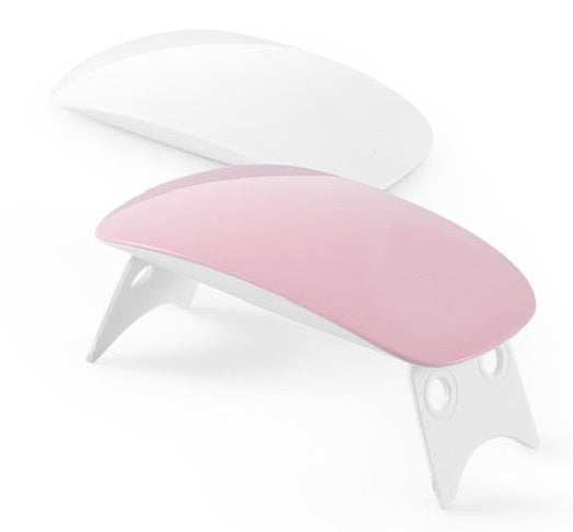 Light Therapy Machine with a pink and white ABS shell, curved design, folding legs and dual LED lamps