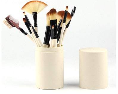 Makeup Brush Set with 12 cream-handled rayon brushes, black accents, and varied shapes in a cylindrical holder