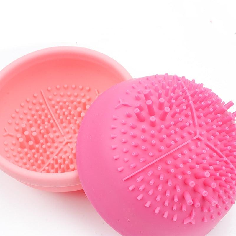 Electric Makeup Brush Cleaner with two pink silicone textured cleaning bowls and raised bristles for makeup brushes