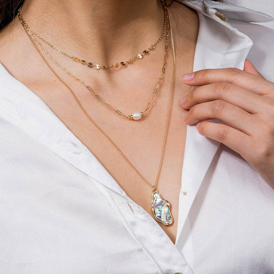 Fashion Personality layered gold-tone necklace with pearl, shell and abalone pendant accents
