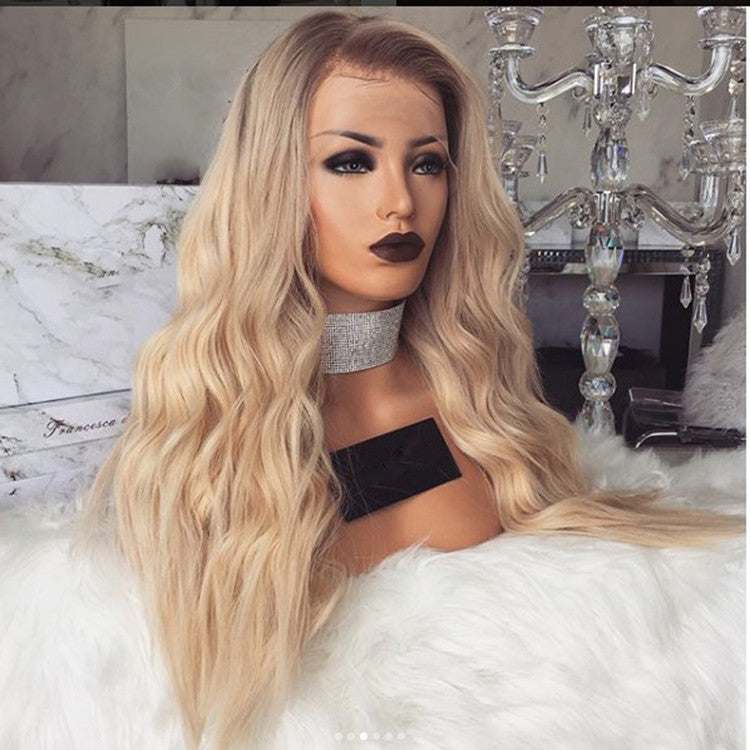 American Style Mid-length Curly Wig in long blonde waves with darker roots, featuring a centre part and voluminous curls