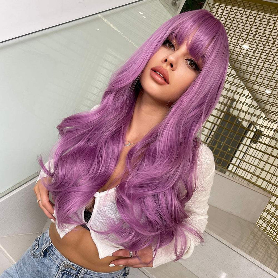 Brown Curly Wig with long wavy synthetic hair, full bangs, and voluminous layered curls in vibrant purple lavender tones