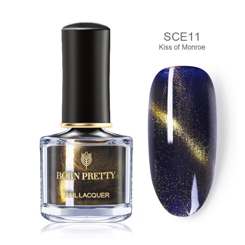 Magnetic Nail Polish in a clear bottle, featuring deep navy blue lacquer with golden glitter and chameleon shimmer