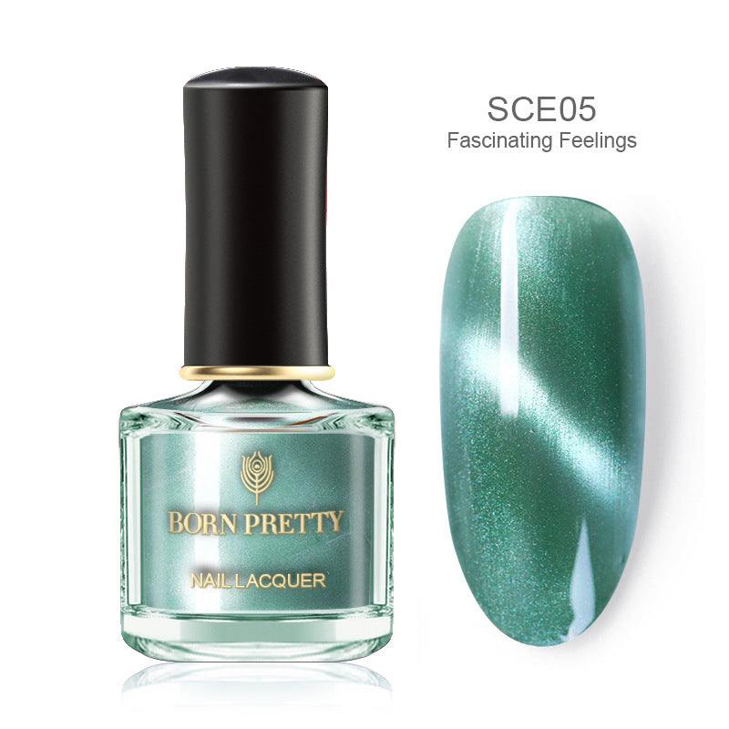 Magnetic Nail Polish in a clear bottle, featuring shimmering teal-green chameleon holographic finish and black cap
