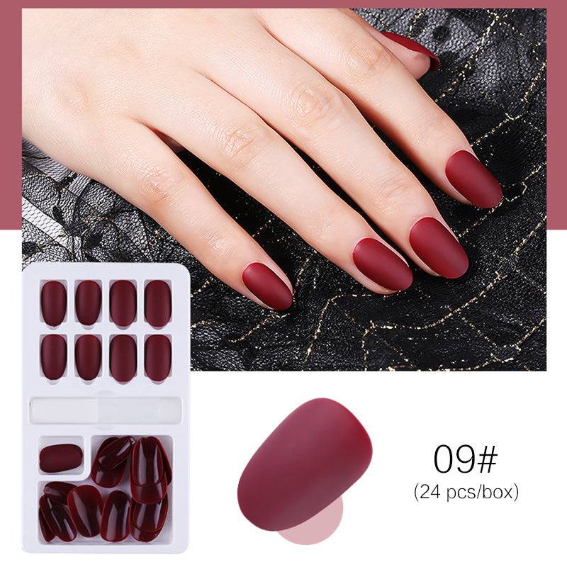 Reusable Stick-On-Nails in deep burgundy, matte acrylic with a rounded almond shape, 24-piece set