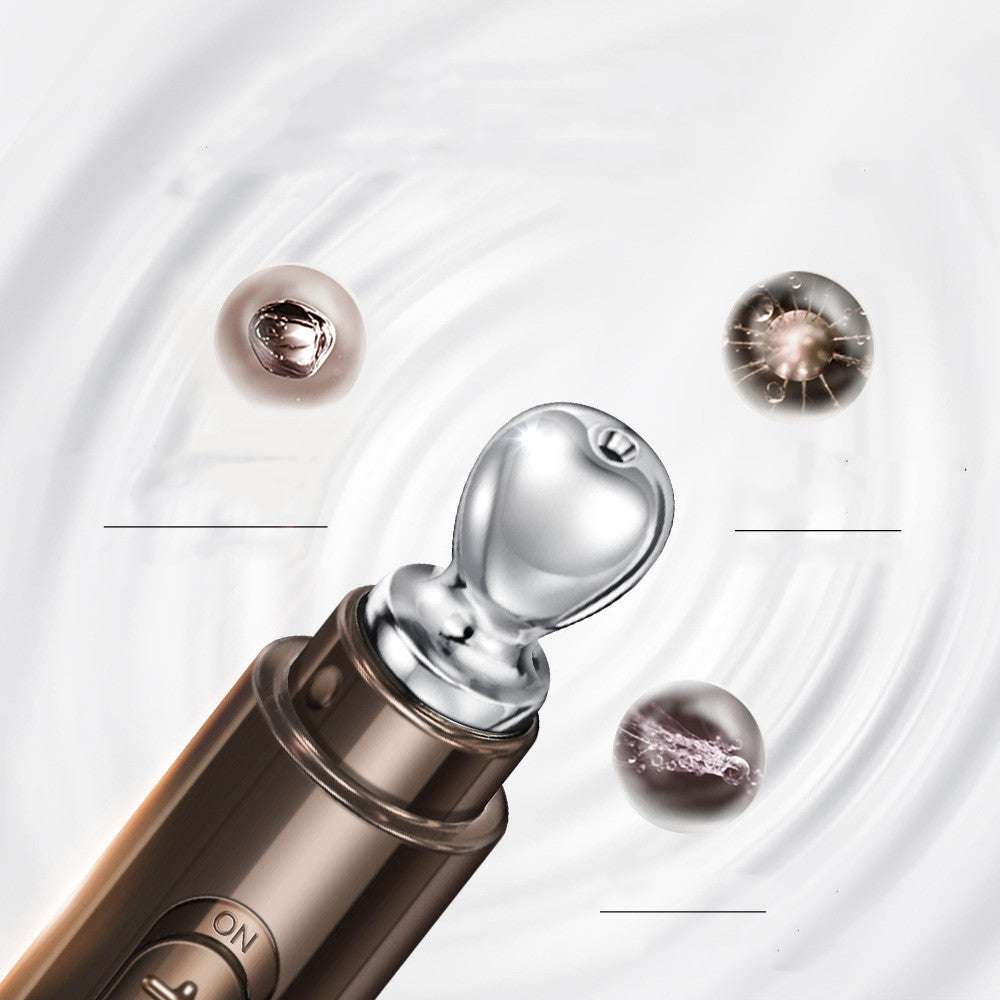 Revitalizing Eye Cream in a metallic bronze tube with a silver heart-shaped applicator tip and reflective finish