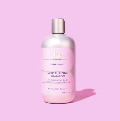 KeraCare Curlessence Moisturising Shampoo in a pink bottle with a silver cap, featuring a rounded design