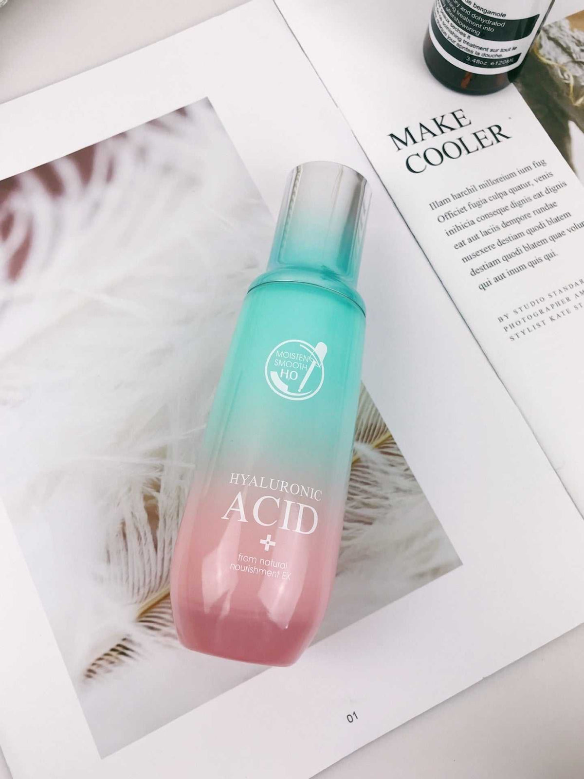 Ultimate Hydration Facial Care Set, turquoise and pink hyaluronic acid serum bottle with gradient design and silver cap