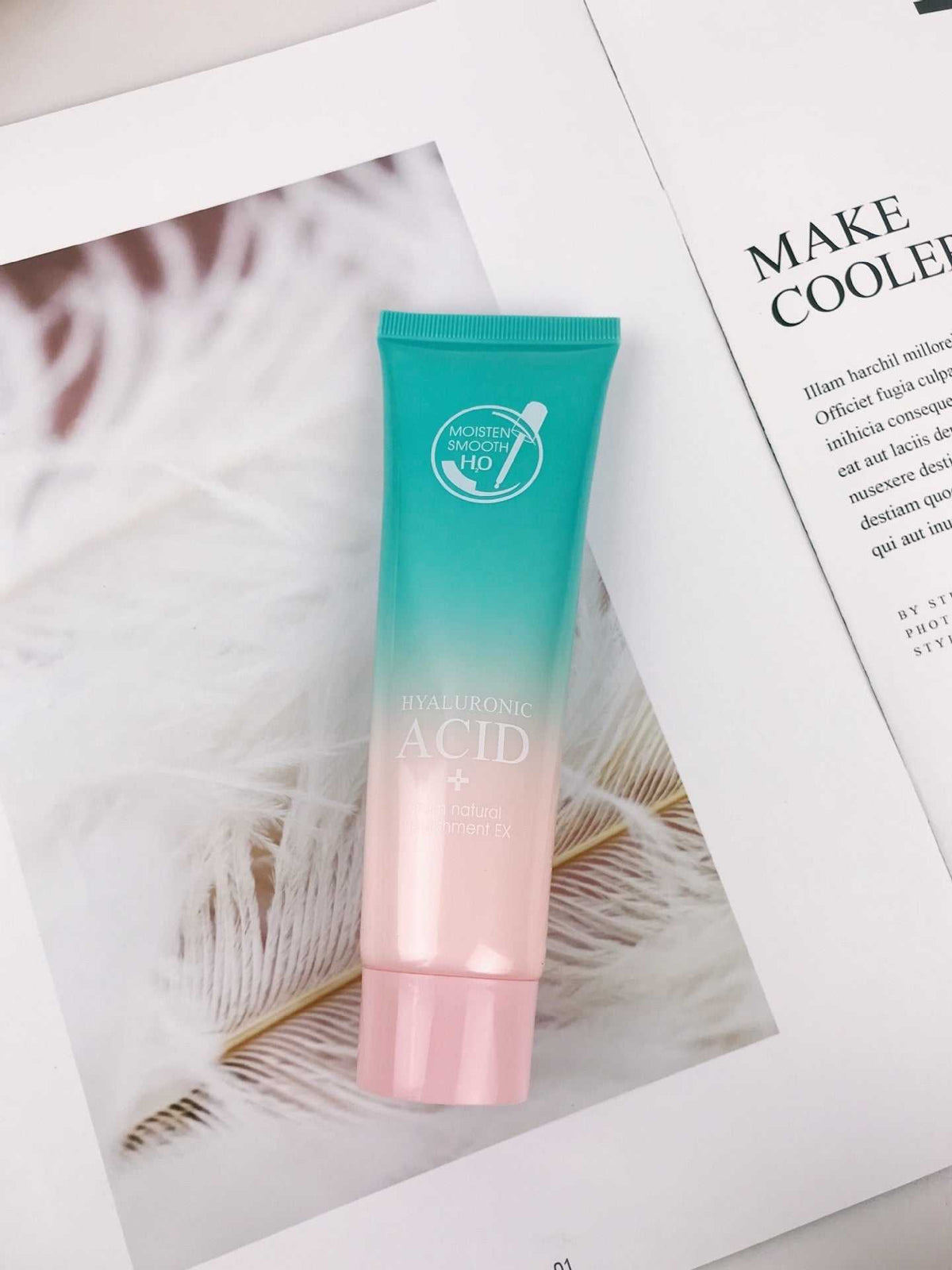 Ultimate Hydration Facial Care Set featuring a pink and turquoise hyaluronic acid skincare tube with flip-top cap