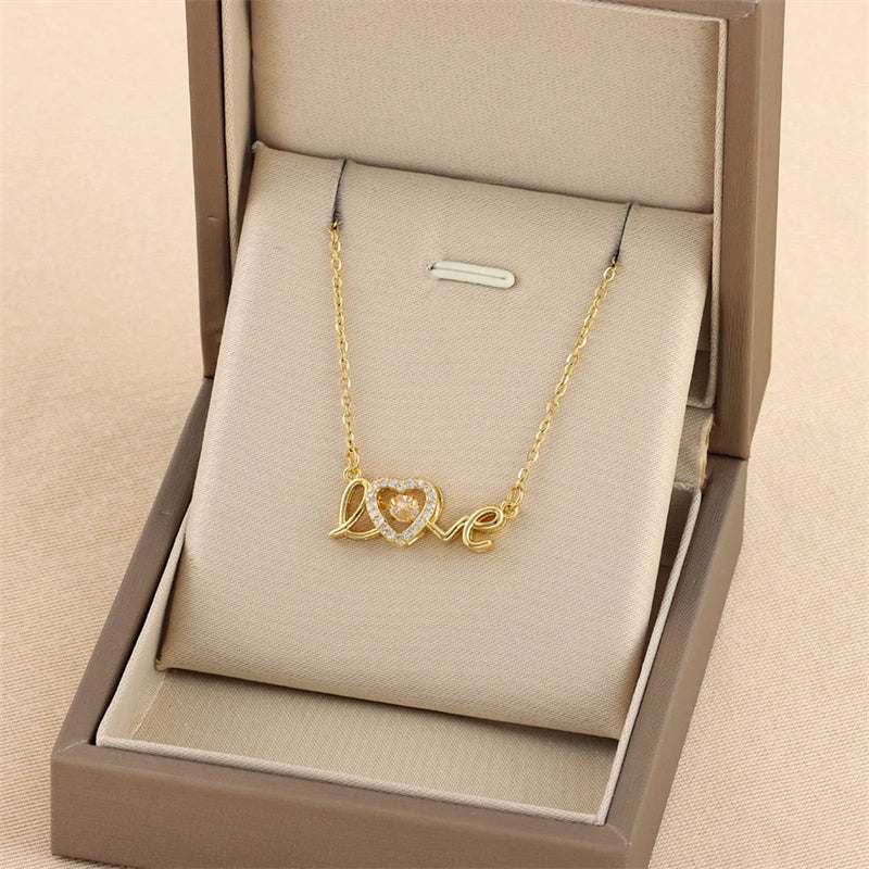 Necklace, gold-tone titanium steel with intertwined heart pendant and crystal accent, ideal Valentines Day Gift