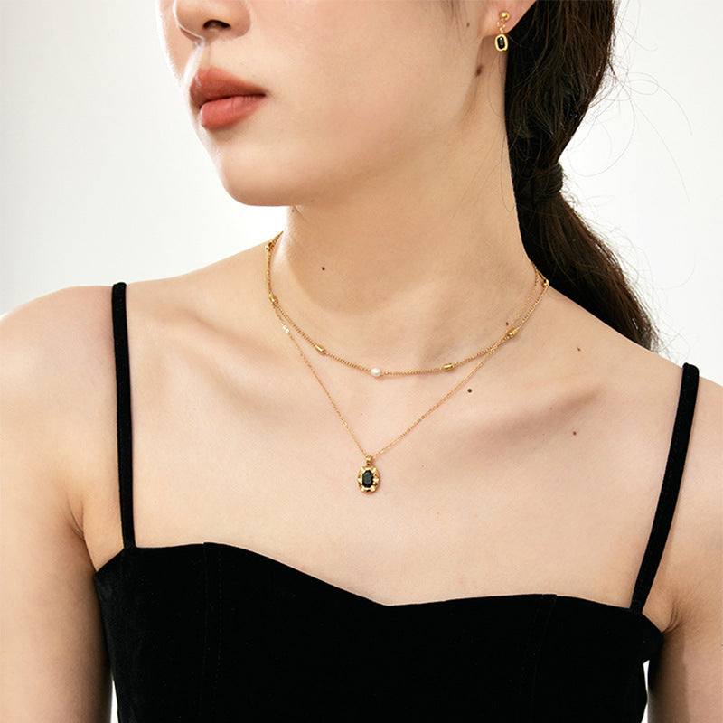 Cool-style 18K Gold-plated layered necklace with delicate chains, tiny beads and a black teardrop pendant