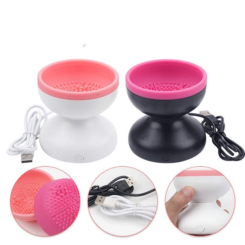 Electric Makeup Brush Cleaner in white and black ABS with pink silicone bowls, textured bristles and USB cables