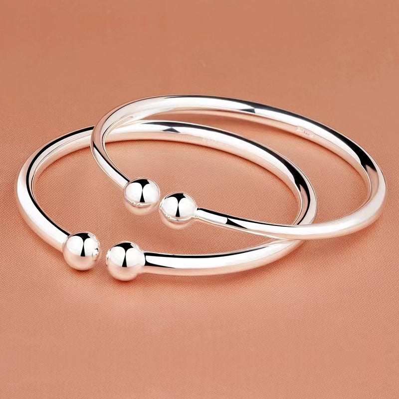 Open bangle in silver-tone copper with a polished plain surface, round shape and ball-ended design, Garlic-head Plain Surface