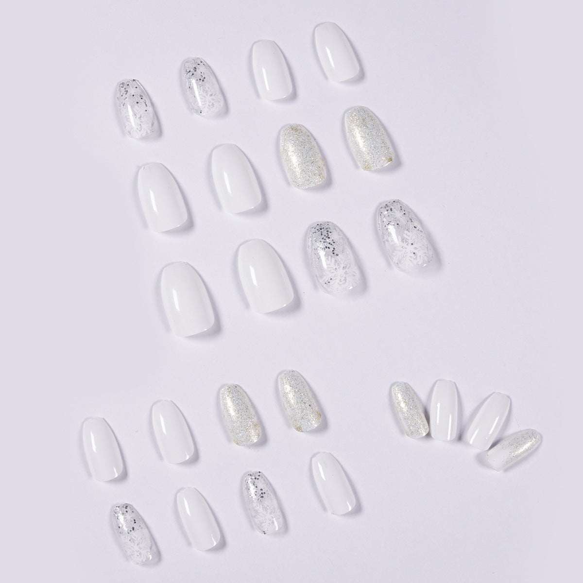 Ice Glitter Short Ballet artificial nails in translucent white with silver glitter and speckled accents